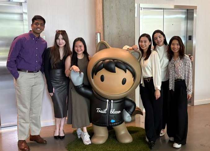 Capstone team with Salesforce Trailblazer mascot at office